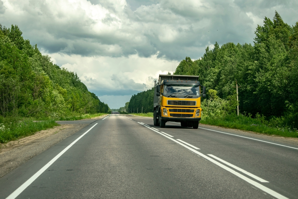 Class 4 truck driving on a New Zealand highway, suitable for heavy vehicle licence training
