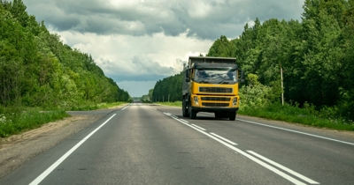Class 4 truck driving on a New Zealand highway, suitable for heavy vehicle licence training
